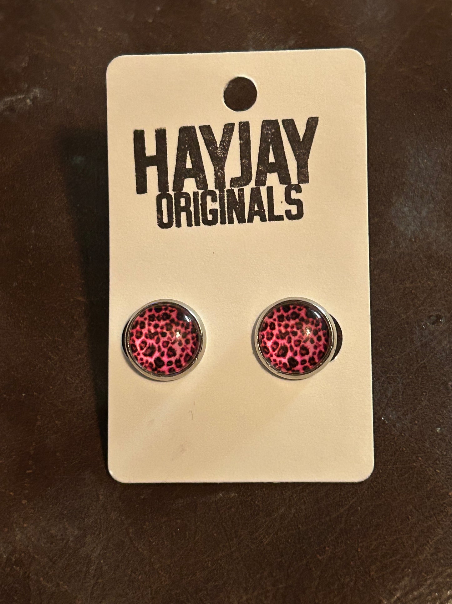 Pink leopard studs