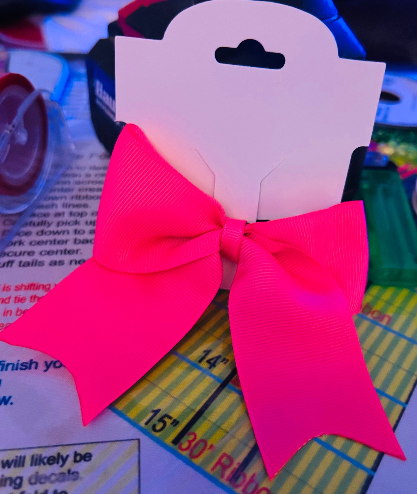 Neon pink ribbon bow
