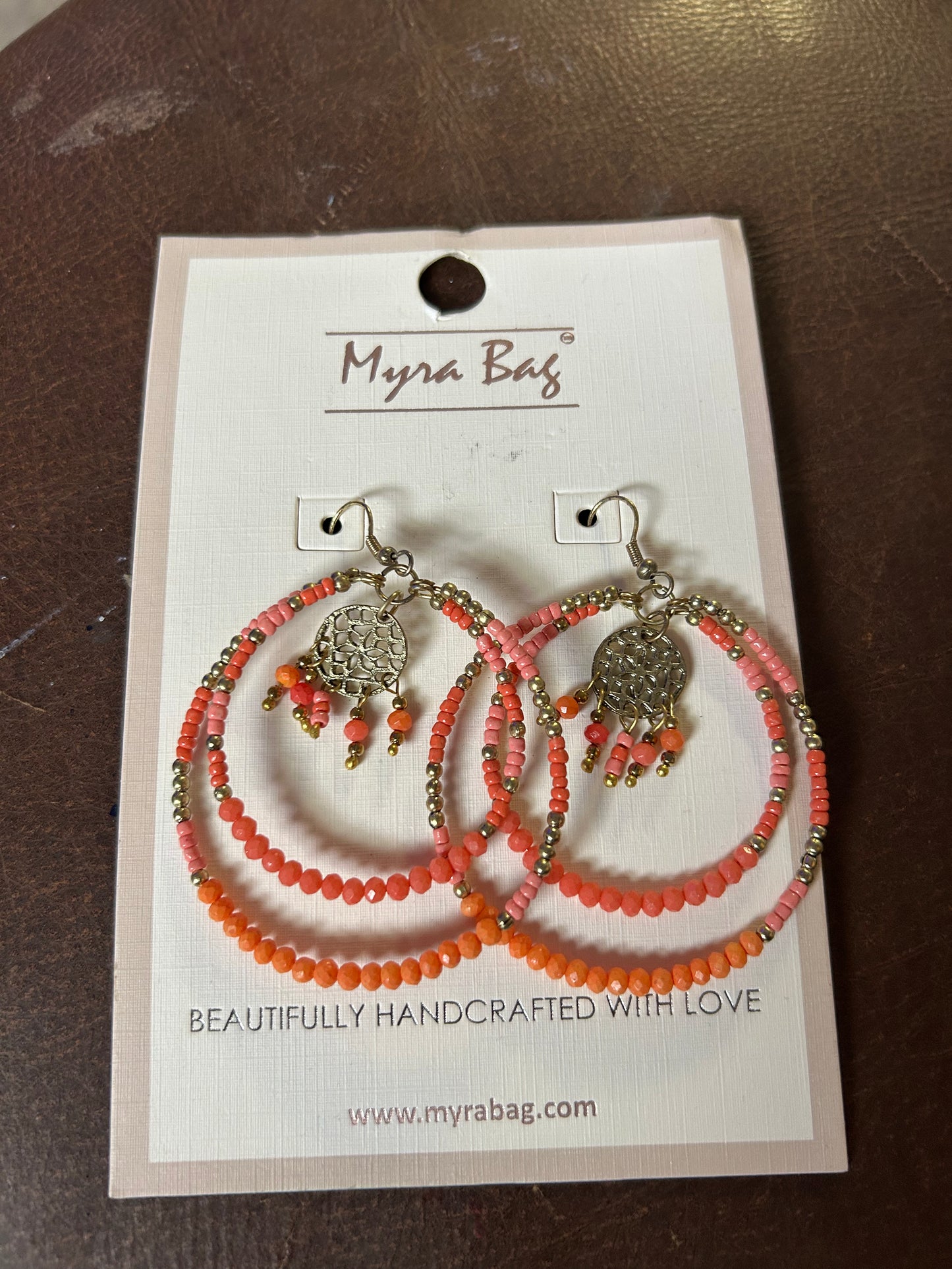 Coral and gold beaded earrings