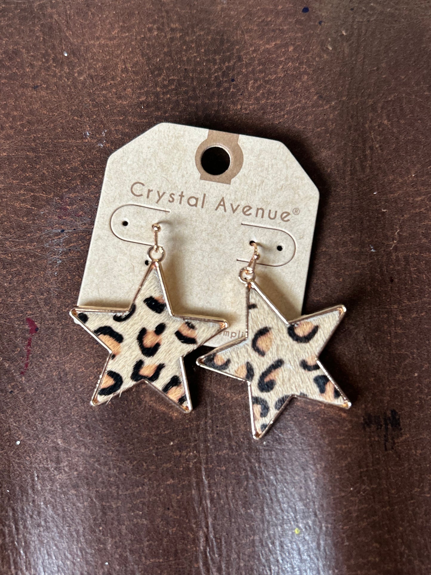 Leopard star earrings
